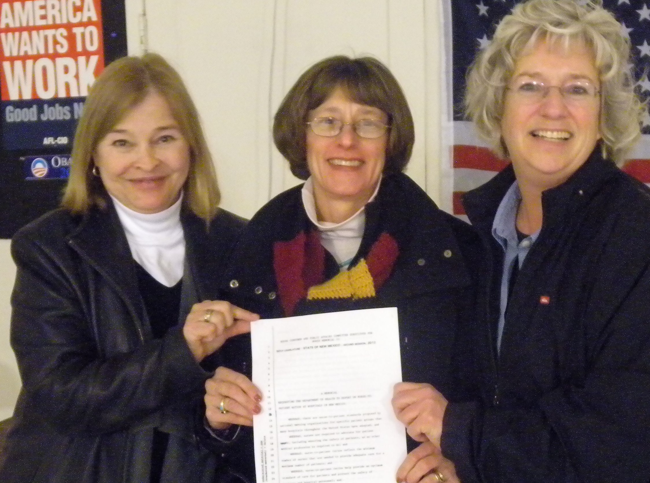 Gail Williams, Diane Spencer, and Sharon Argenbright. Holding a copy of Memorial 51 for safe staffing ratios, which was passed by the House of Representatives!